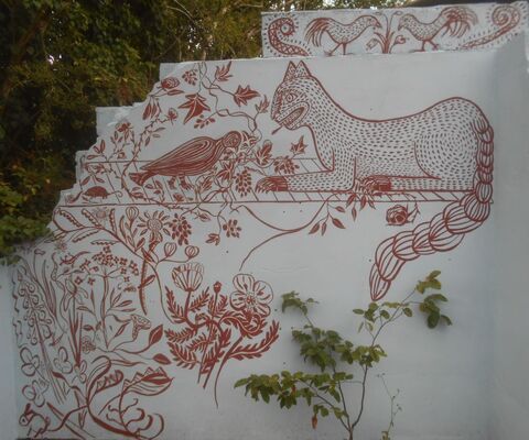 Mural on the old village dairy wall, Littlestock . 
